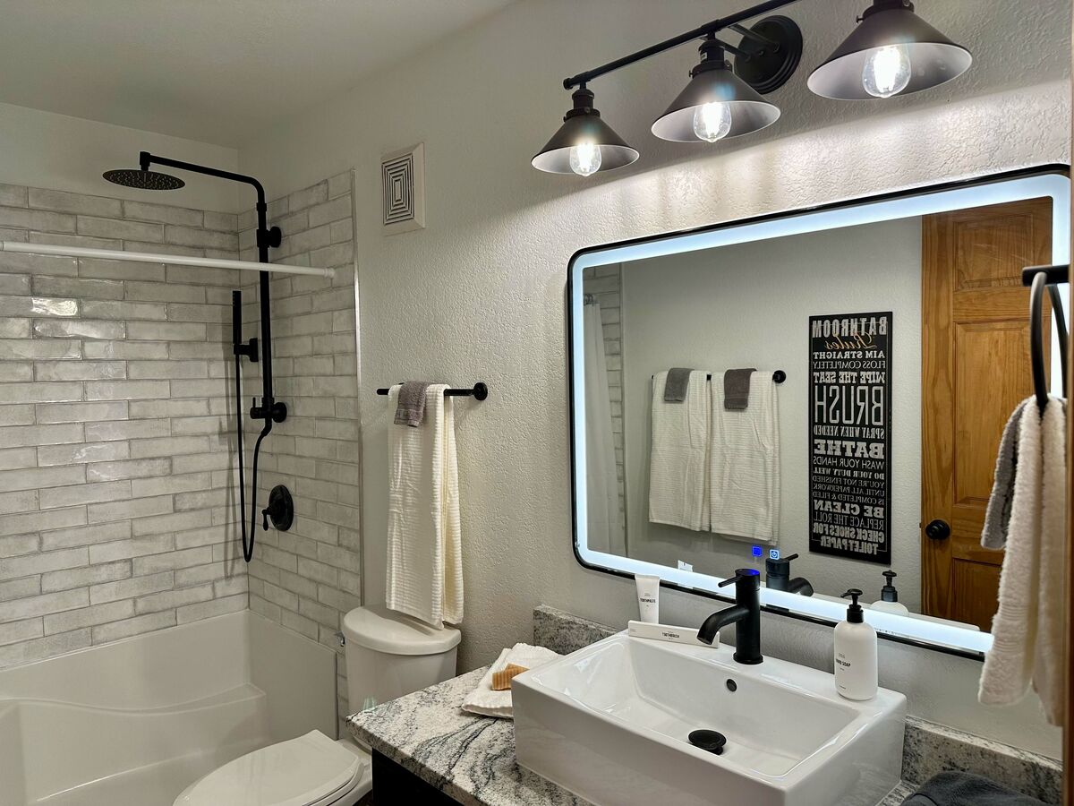 LED mirror in each updated bathroom
