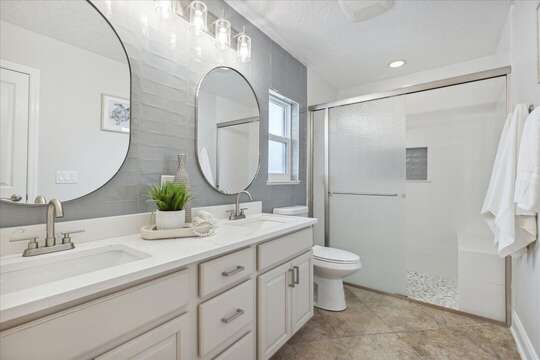 Guest bathroom w/ His & Hers sinks, Stand up shower