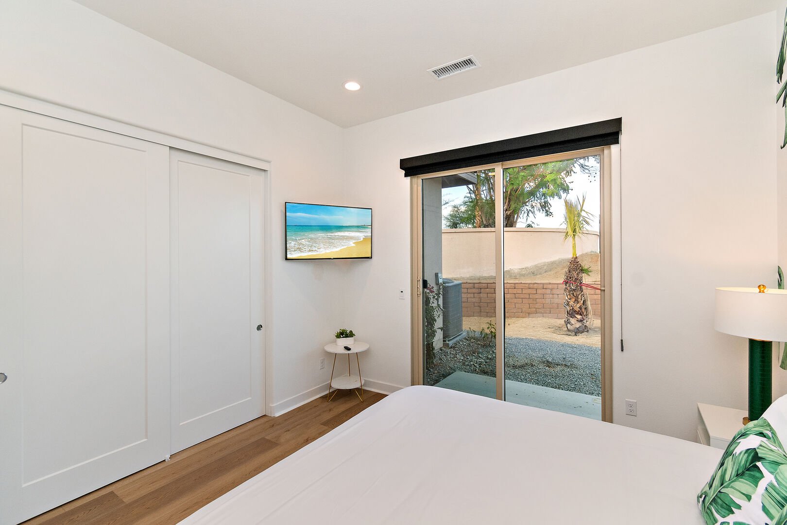 Enjoy access to the back patio from bedroom 2.