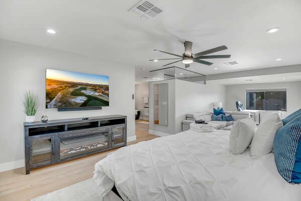 Master Bedroom with King Bed, Sitting Area and 65