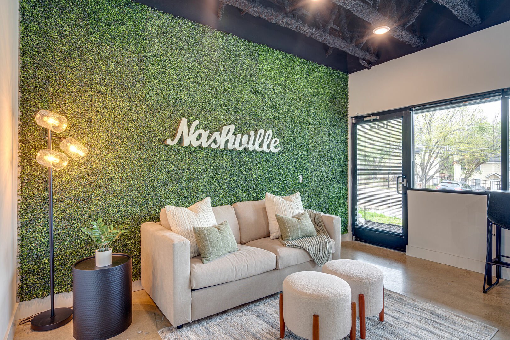 Light and Bright living space featuring Nashville themed designer furnishings!