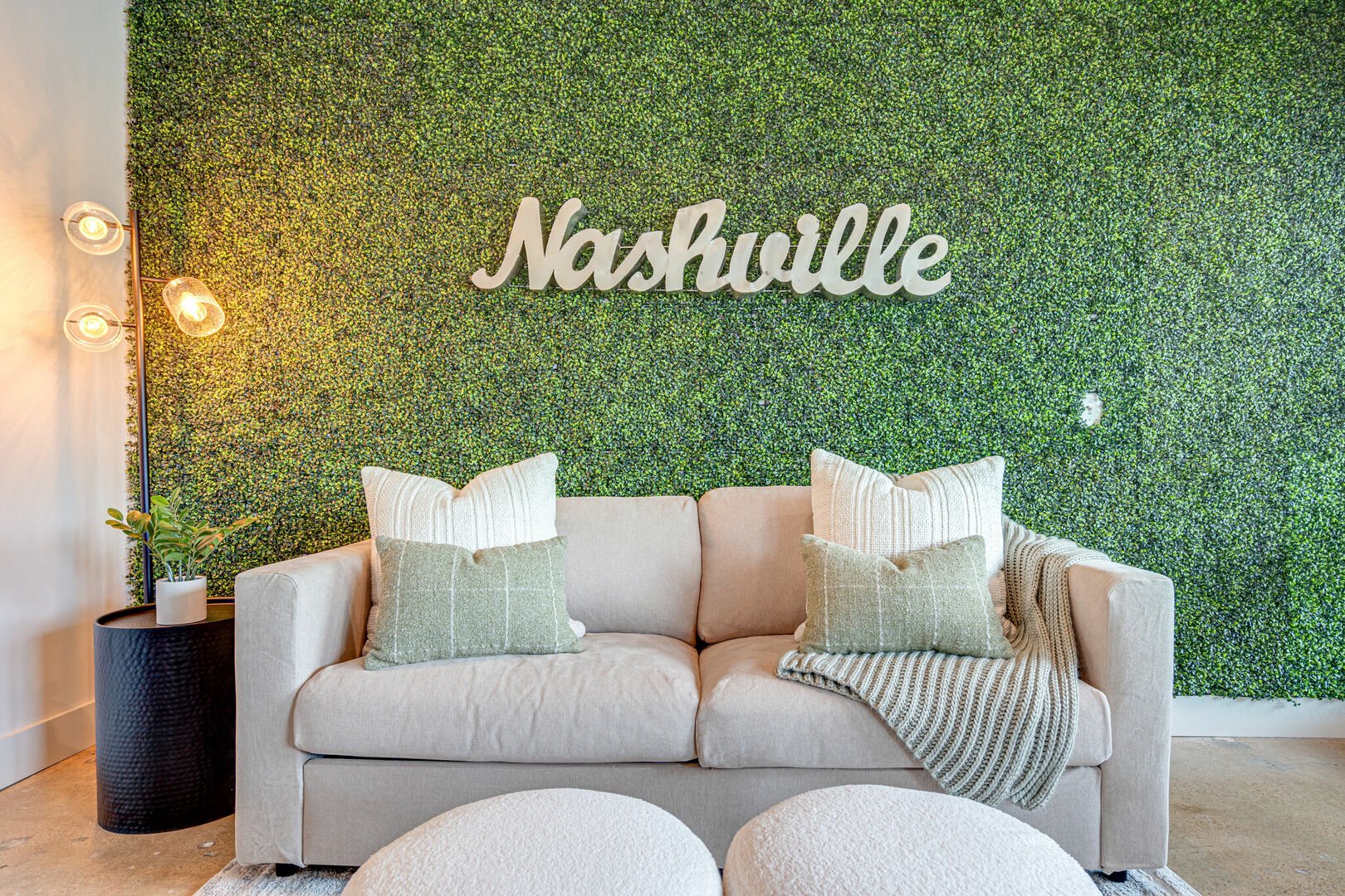 Light and Bright living space featuring Nashville themed designer furnishings!