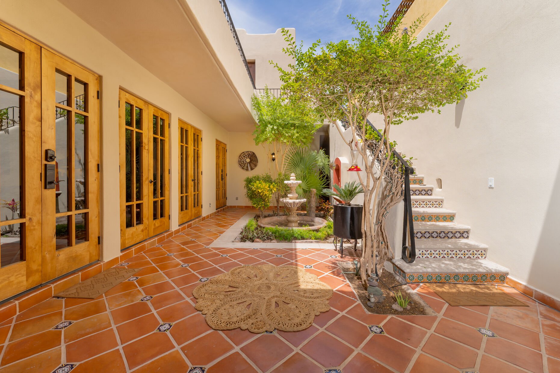 Main floor patio/ Laundry area / Fountain / Stairs to 2nd floor

Casa de los abuelos, 3Beds, Private pool, 2 bikes available for guest. Beautiful Mountain View.