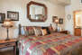Upper level master bedroom with comfortable king size bed