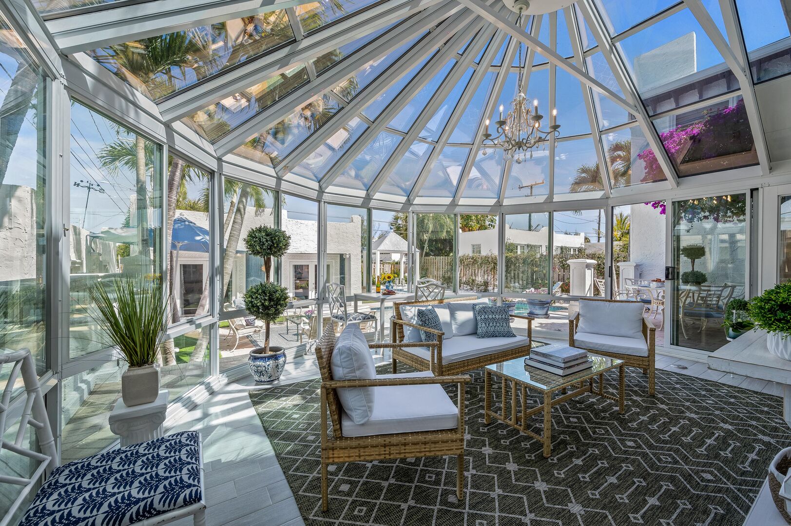 Basking in the warmth of the sunroom, where relaxation and natural light come together in perfect harmony.