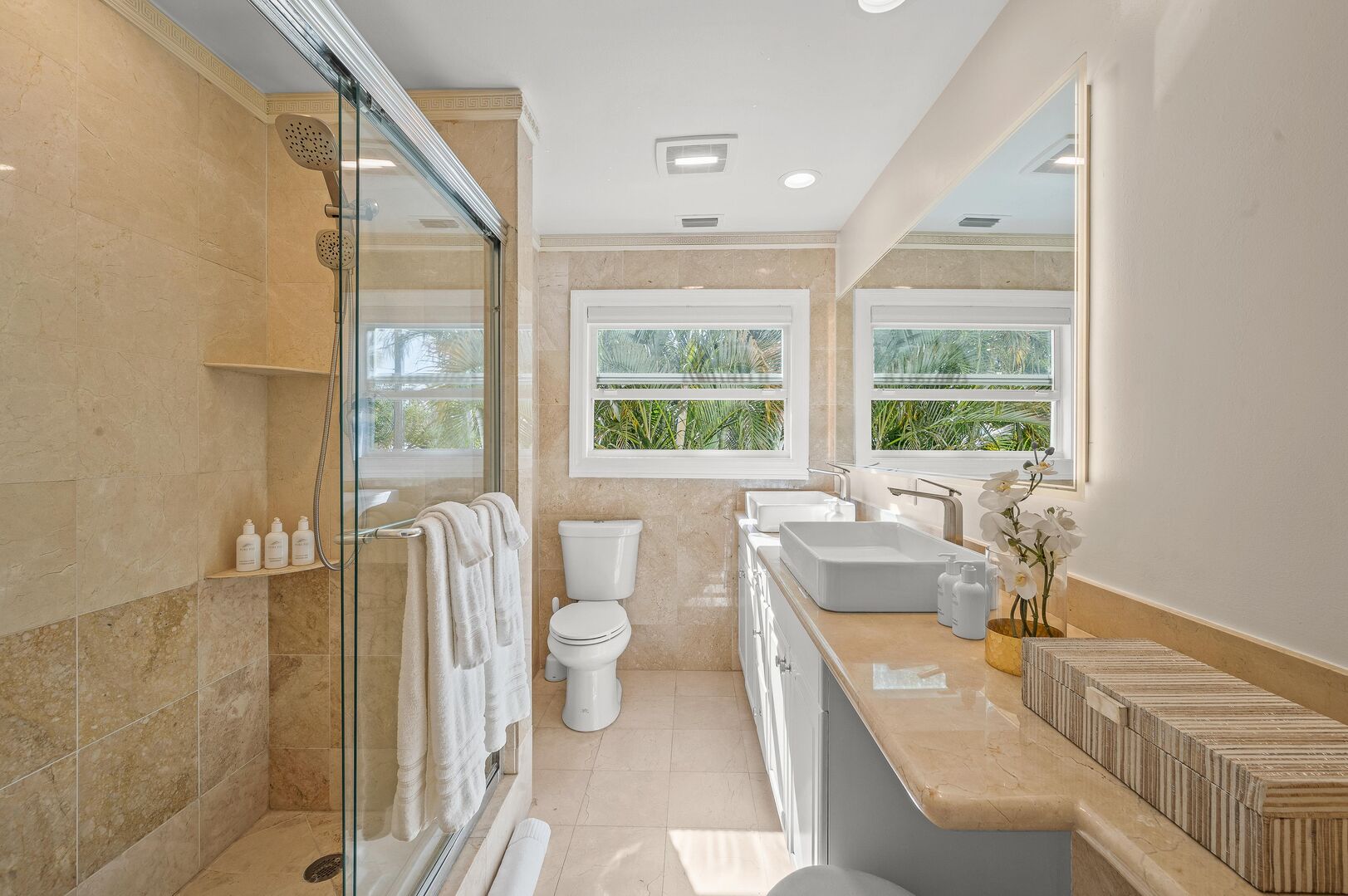 The upstairs bathroom features a walk in shower, double vanity and spa like amenities.