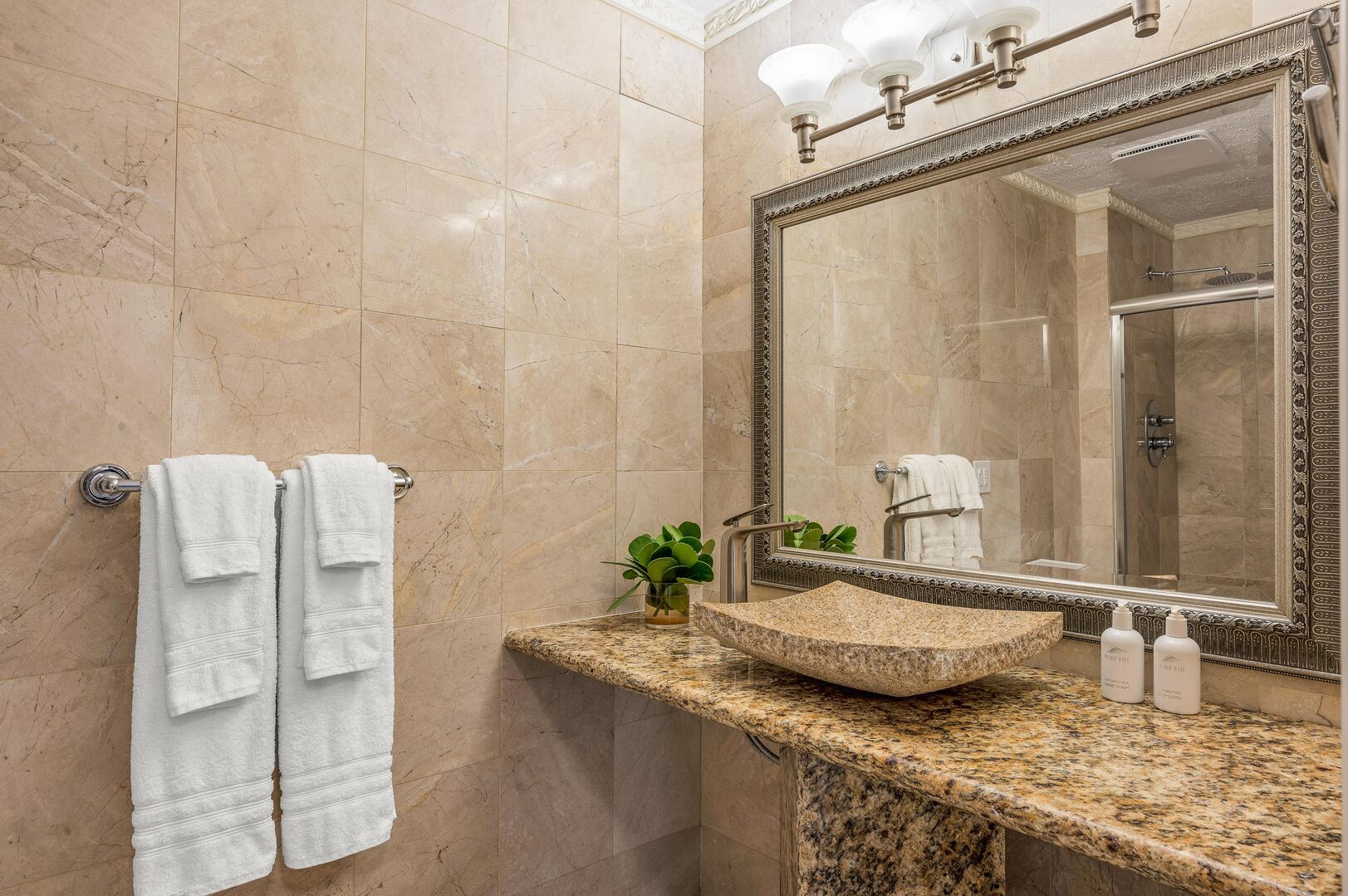 Downstairs you will find a full bathroom with spa like amenities.
