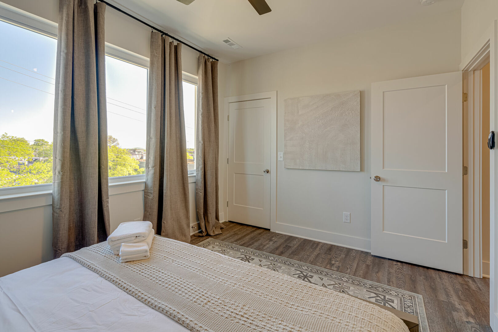 3rd floor: 2nd Bedroom featuring a King bed and designer furnishings with ensuite bathroom.