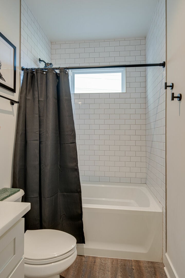 4th bathroom with shower and tub combo.