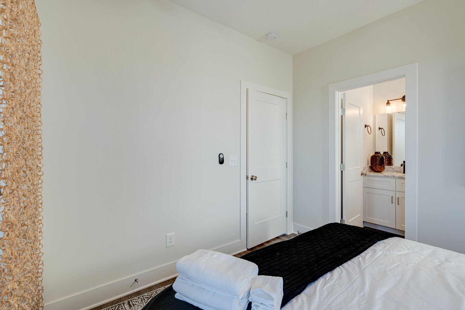 2nd bedroom with king bed with en-suite bathroom