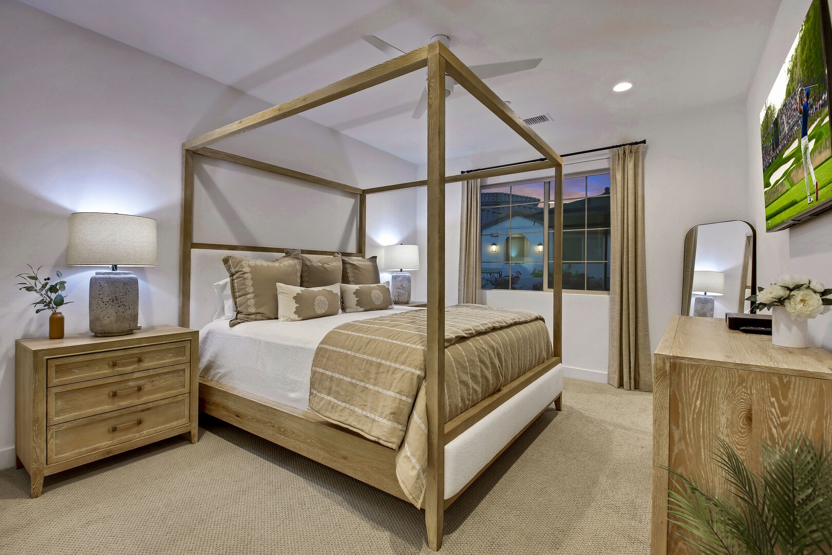 Master Suite 1 is located next to entrance doors and features a King-sized Bed.
