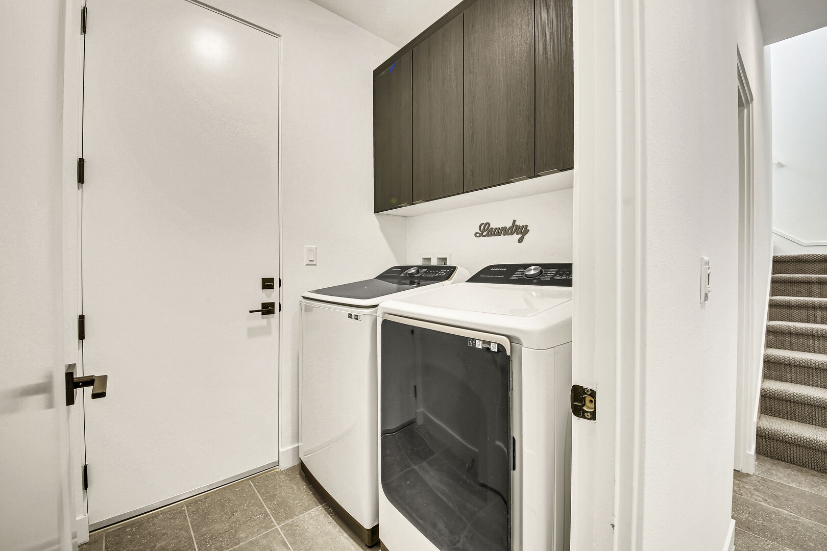 The laundry room is equipped with a washer and dryer so that you may go back home with clean clothes.