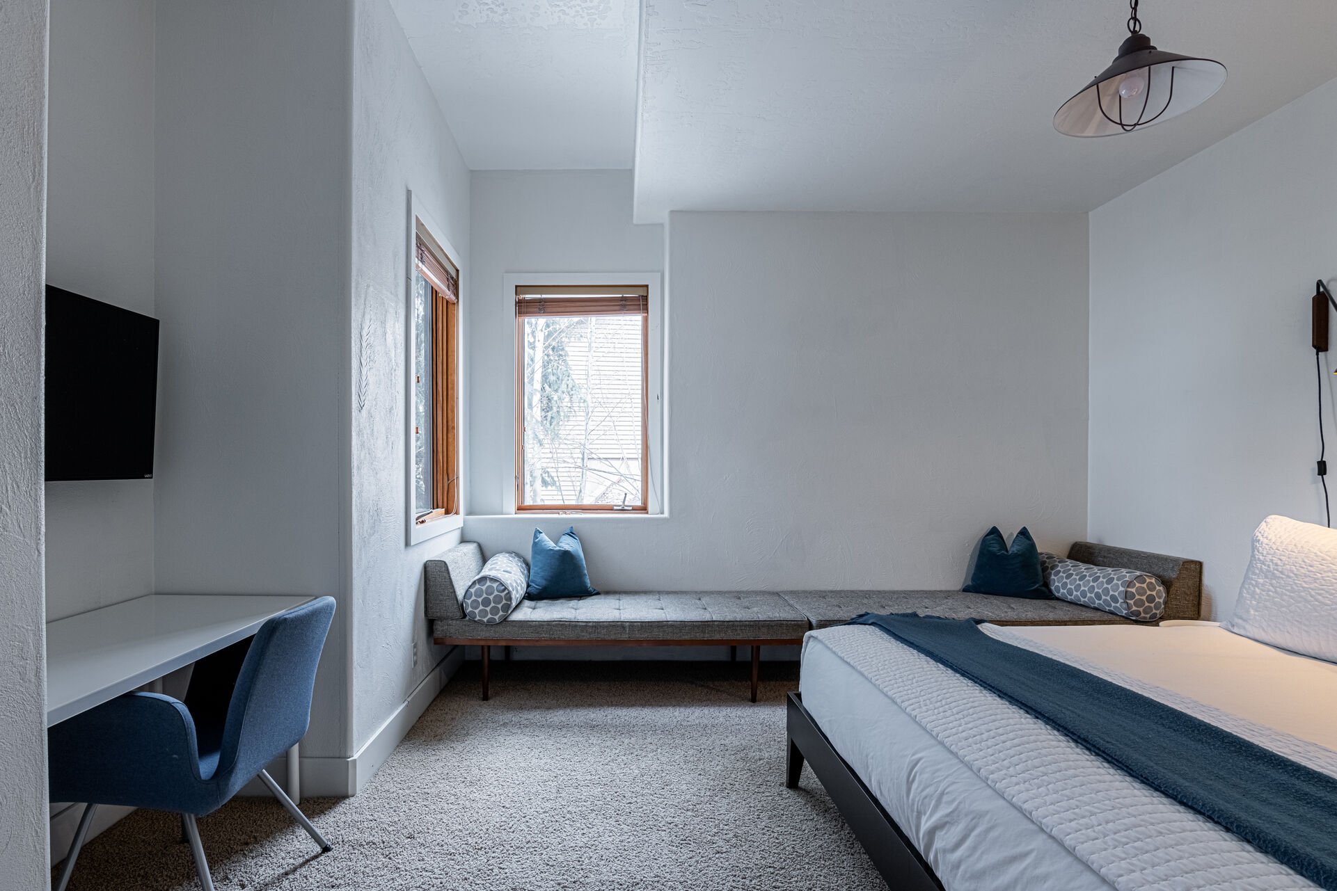 Master Bedroom 2 with a King Bed, Bench Seating, Desk and Smart TV