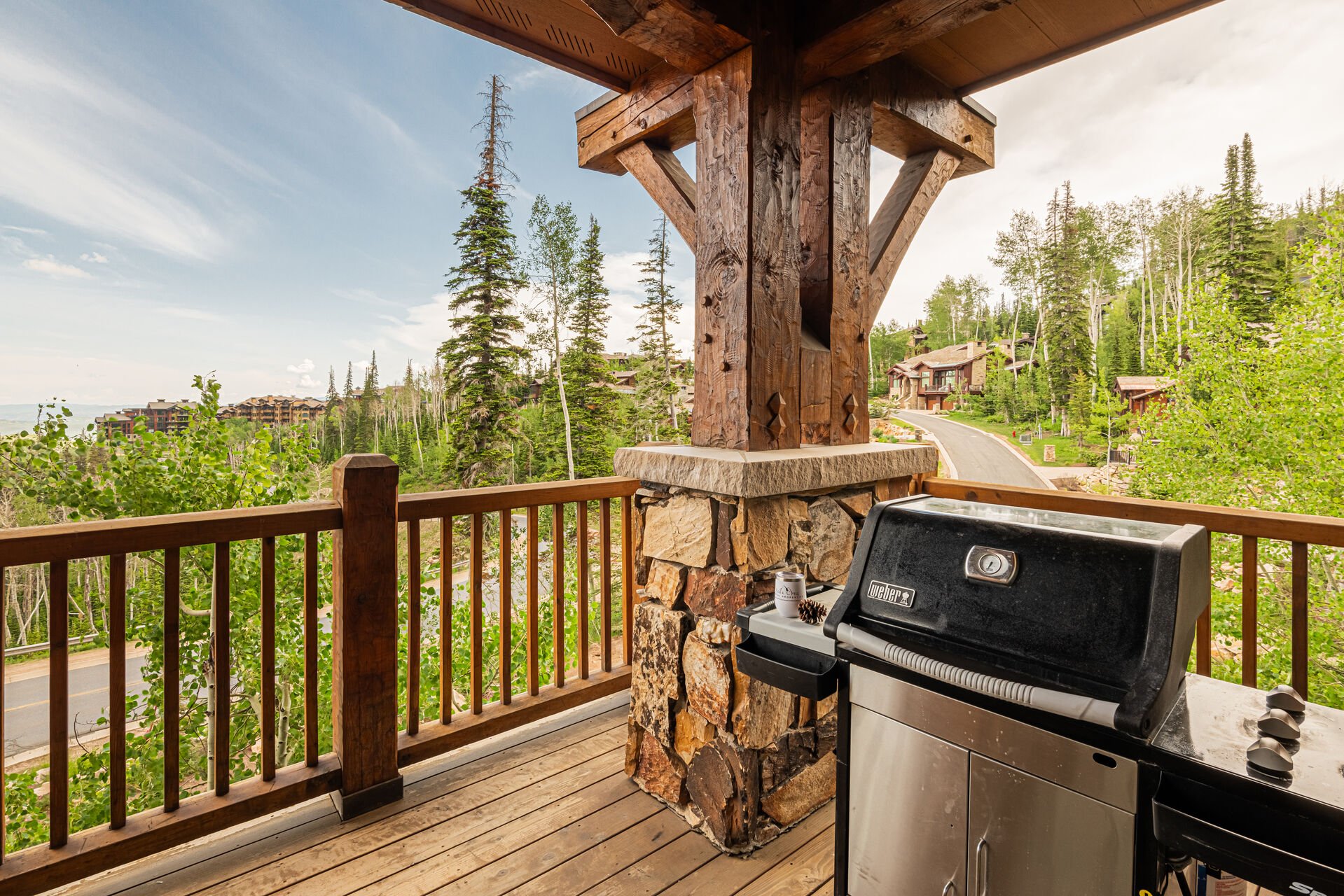 Private balcony with propane grill and mountain views