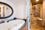 Large jetted tub and a steam shower