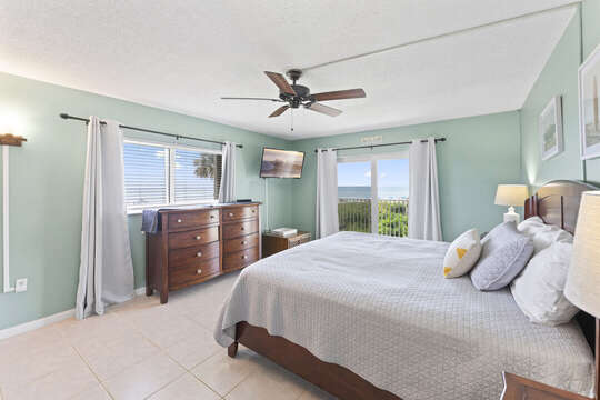 Master bedroom with king bed and oceanfront view!
