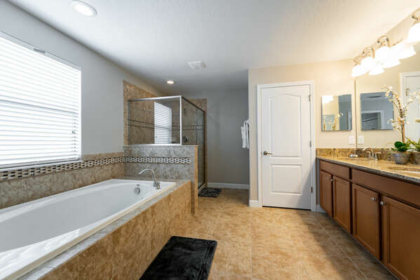 Grand master suite bath with garden tub, shower and dual sink vanity