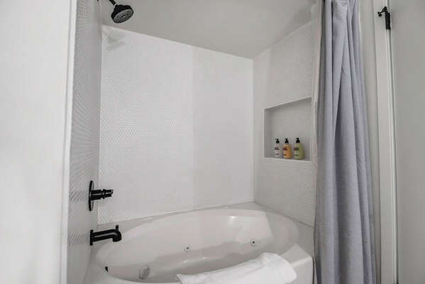 Full Shared Bathroom Two with Jetted Tub and Shower Combo