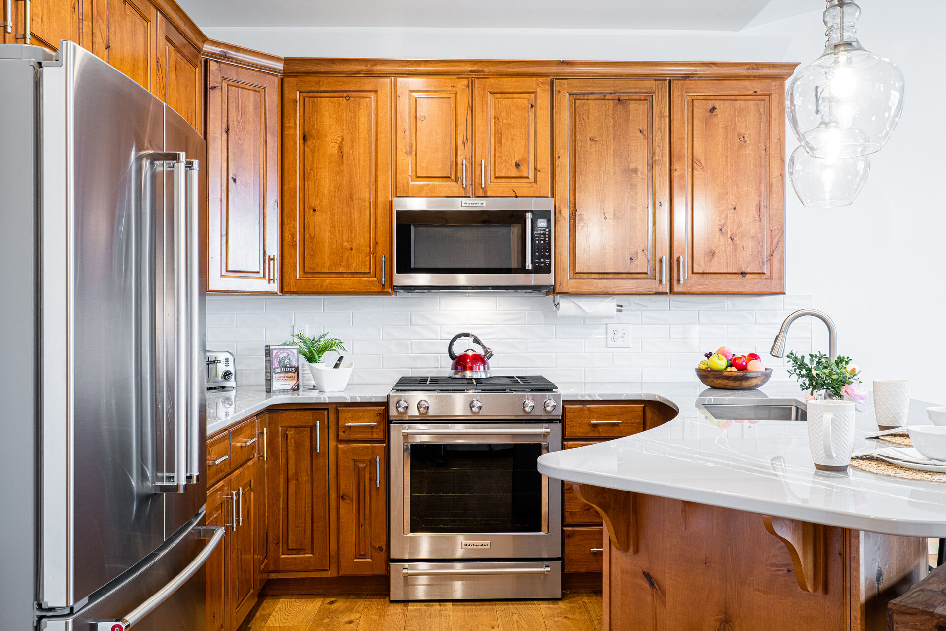Stone Counters and Stainless Steel Appliances Including Gas Range