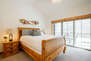 Upper/Main Level Master Bedroom with a Queen Bed