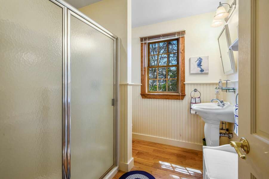 Primary Bedroom en suite bathroom with shower - 18 Beach Road West Harwich - Cape Cod - Beach Plum Cottage - NEVR