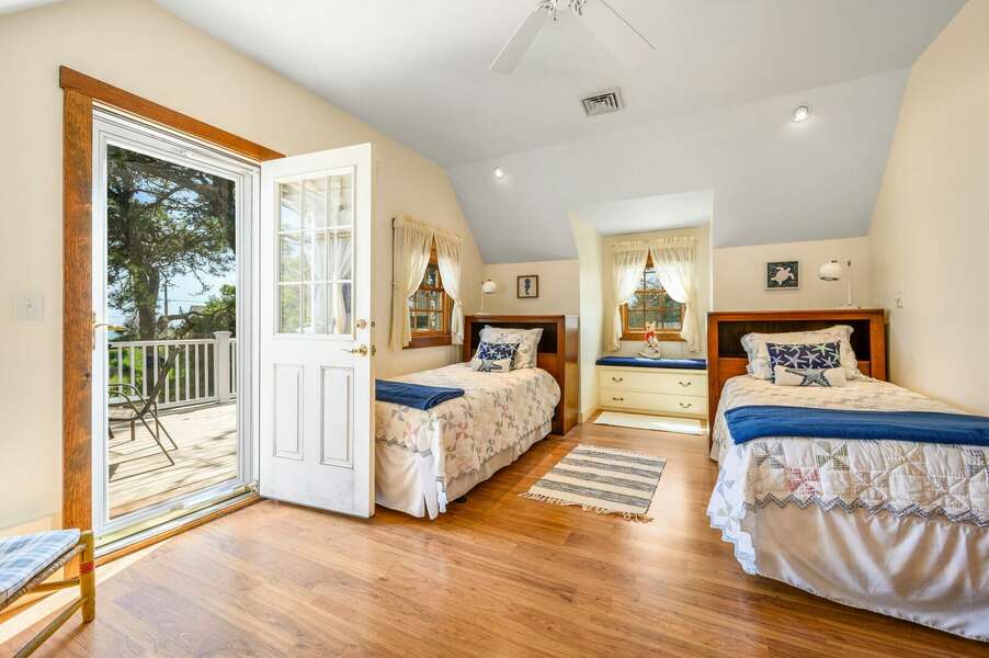 This upper level bedroom has direct access to the deck - 18 Beach Road West Harwich - Cape Cod - Beach Plum Cottage - NEVR