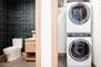 In-unit stacked washer and dryer