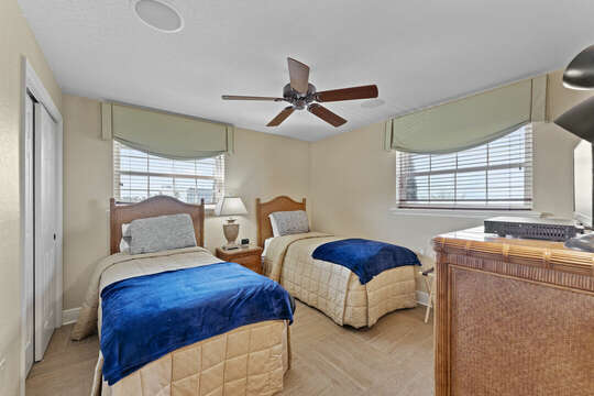 Guest bedroom with two twin beds.