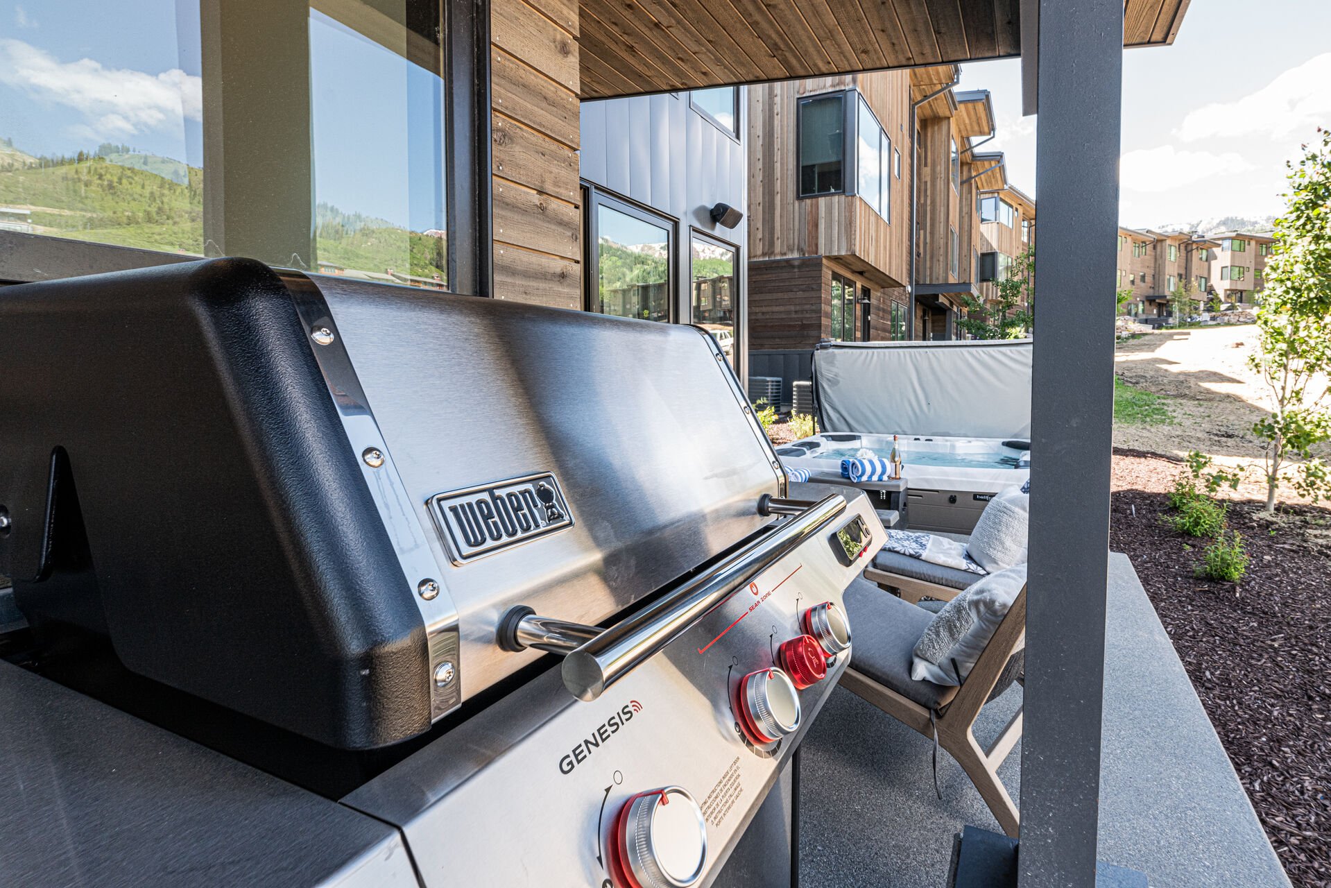 Weber propane grill on private patio