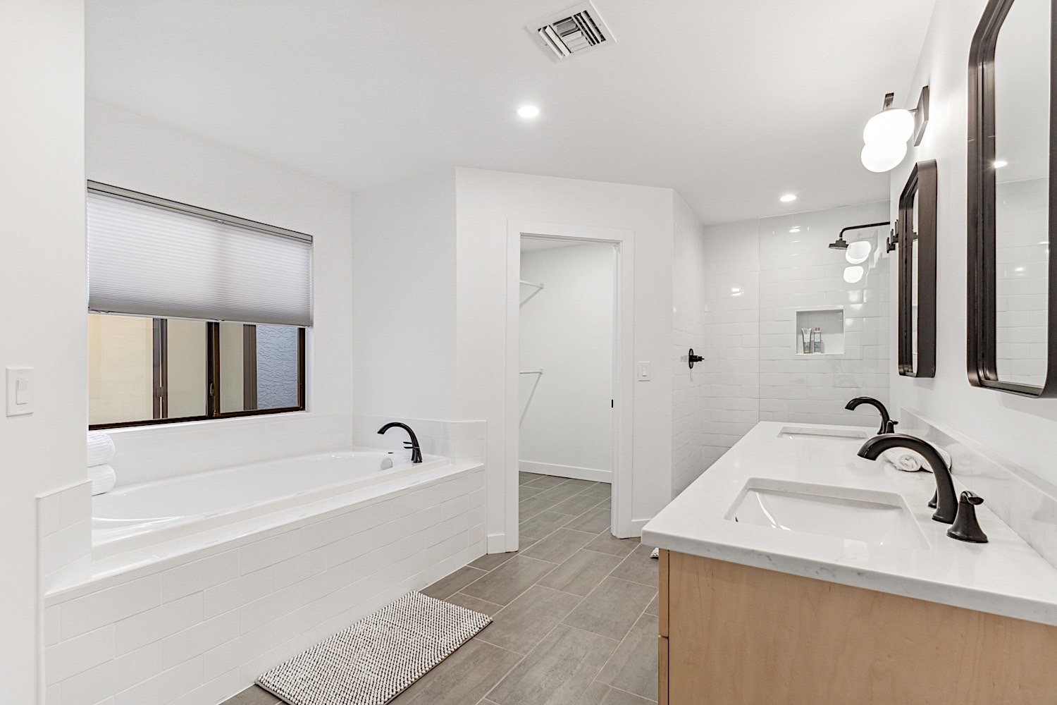 Master bathroom - Large soaking tub, walk-in shower, his & hers sinks and dual walk-in closets