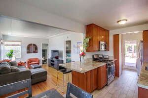 Open flow from living room, dining and into the fully equipped kitchen