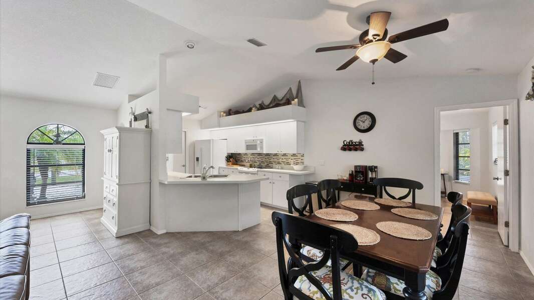 Open floor plan with kitchen and dining