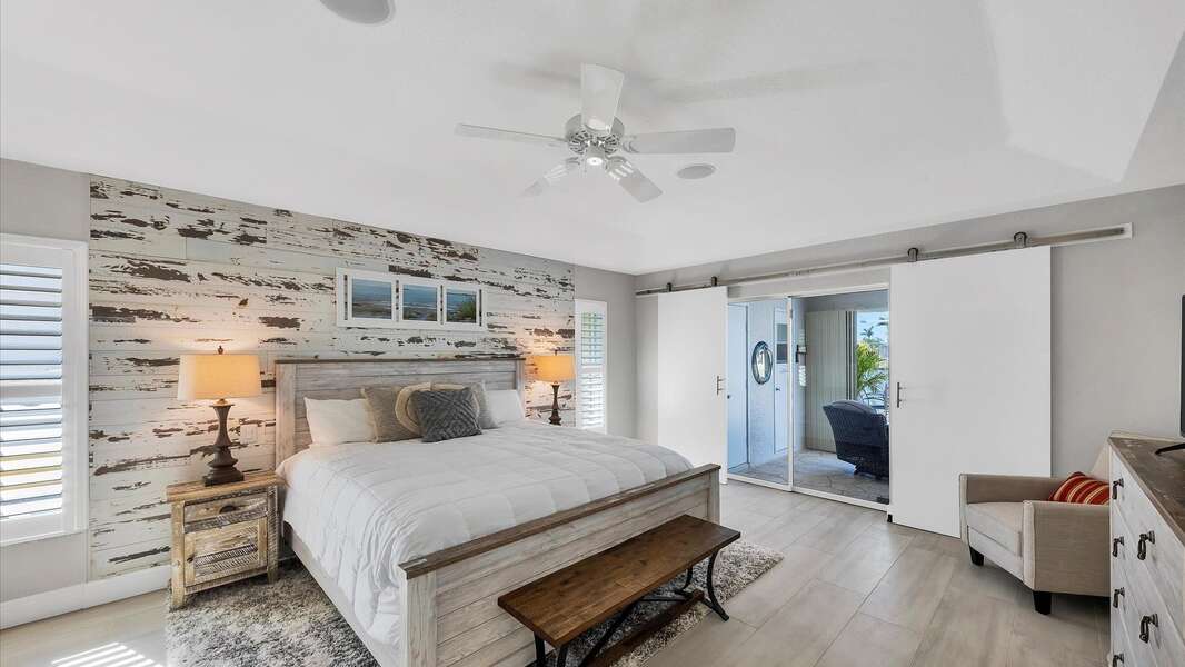 Gorgeous master bedroom with king bed and lanai access