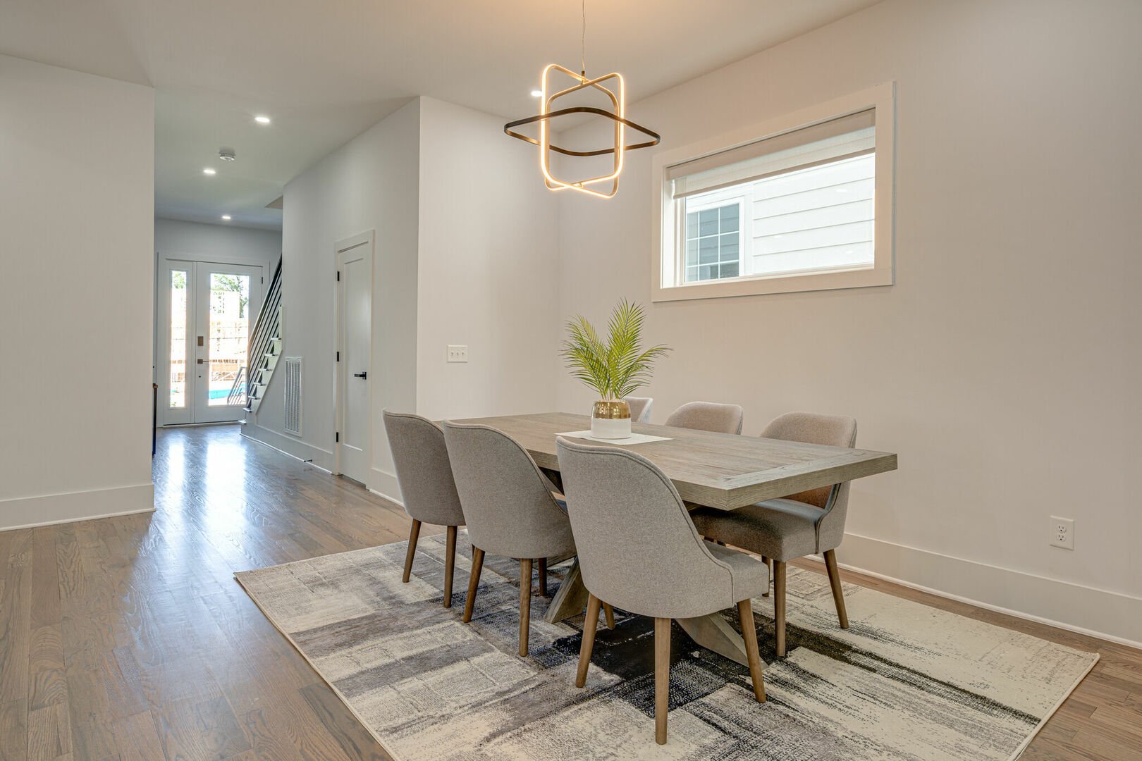 1st Floor: Gourmet style kitchen featuring all stainless steel appliances, coffee bar, wine fridge, breakfast bar, and formal dining area that seats 6.