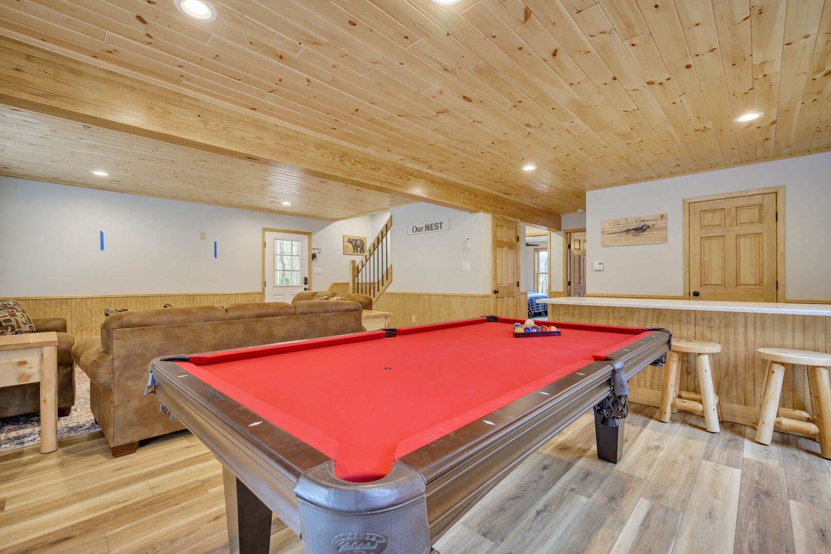 1st Floor Game Room features a Pool Table, Bar and Comfy TV Lounging area.