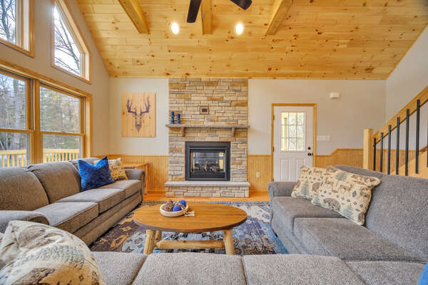 Cozy Seating in the 2nd Floor Great Room with view of Indoor/Outdoor Fireplace.