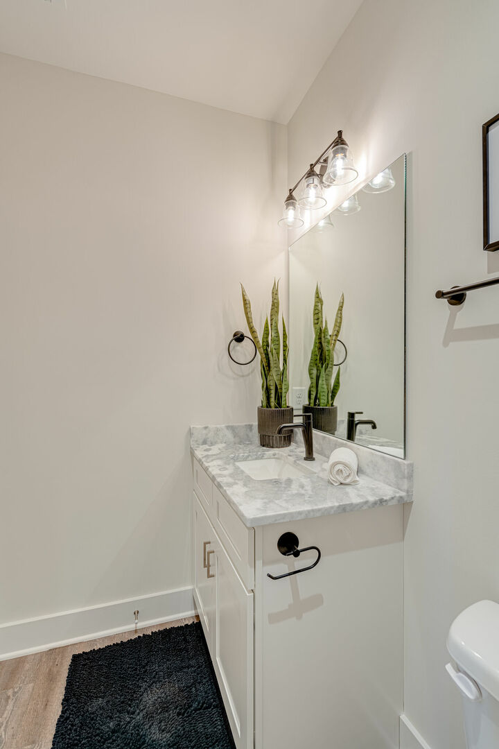 2nd Bedroom ensuite bathroom featuring a single vanity and shower/tub combo. (3rd Floor) -Unit 3-