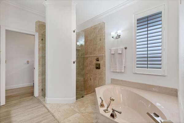 Ensuite has walk-in shower and a soaking tub