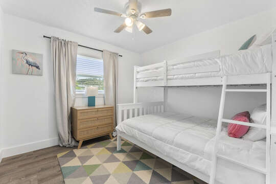 Guest bedroom with twin over double bunk bed