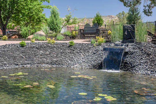 Take in the Calming Waterfall into the Private Pond