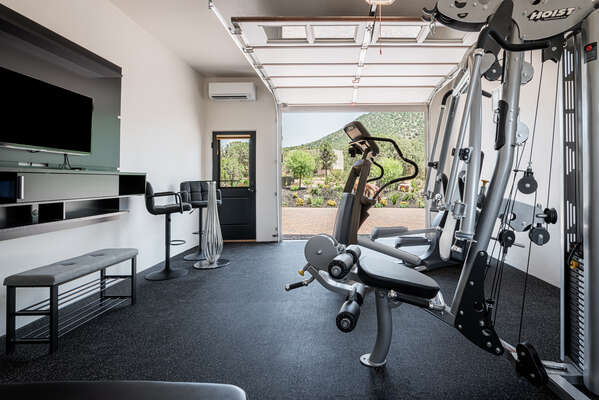 Enjoy the Private Fitness Area with Plenty of Work Out Equipment