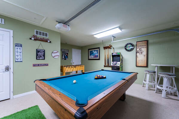 Game room with AC pool and foosball tables and arcades!