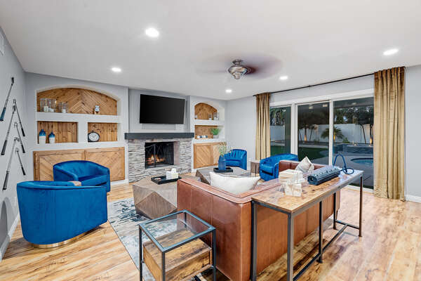 Modern Living Room Space with Plenty of Seating, Smart TV and Access to the Backyard