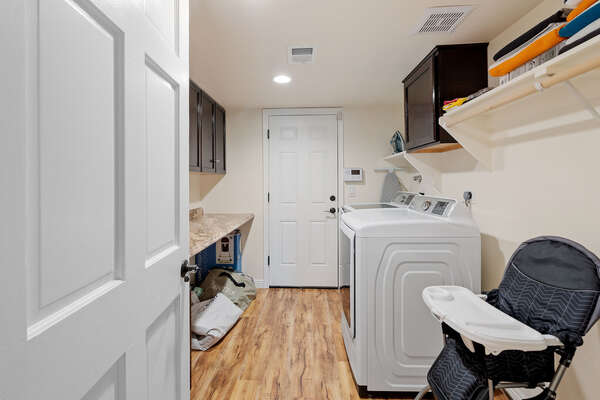Oversized Laundry Room with Full Size Washer and Dryer