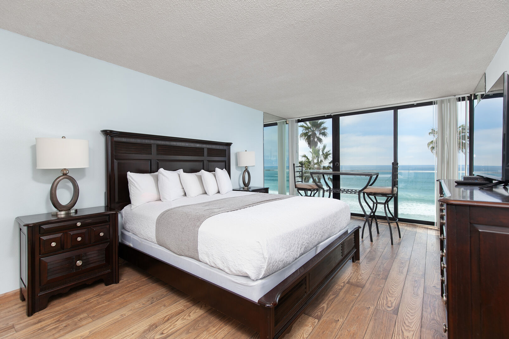 Primary Bedroom with ocean view and king bed