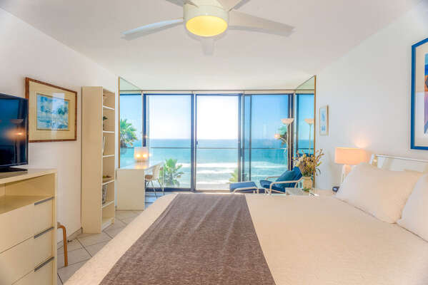 Primary Bedroom with ocean view and a king bed