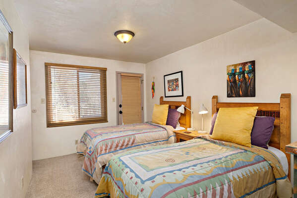 Bedroom 2 with 2 Twin Beds & Balcony Acces