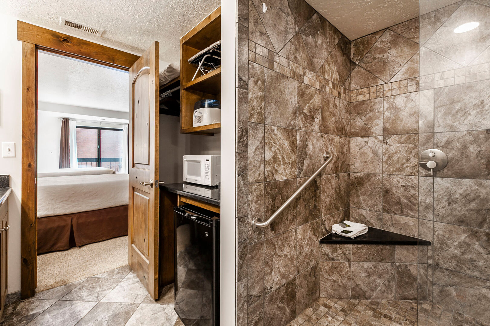 Ensuite Bathroom with Walk-in Shower & Mini fridge, coffee maker, and microwave