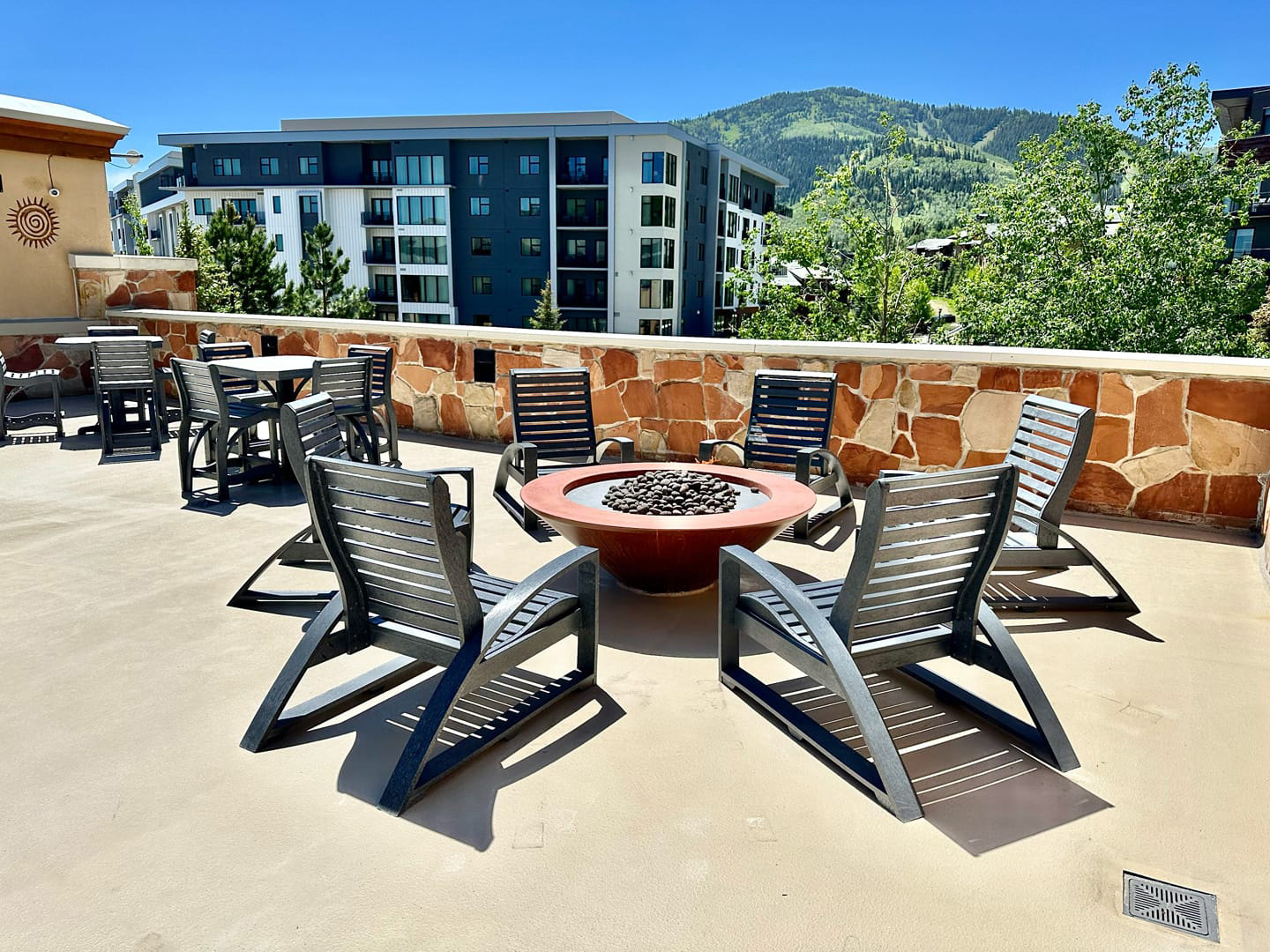 Skybridge fire pit and tables