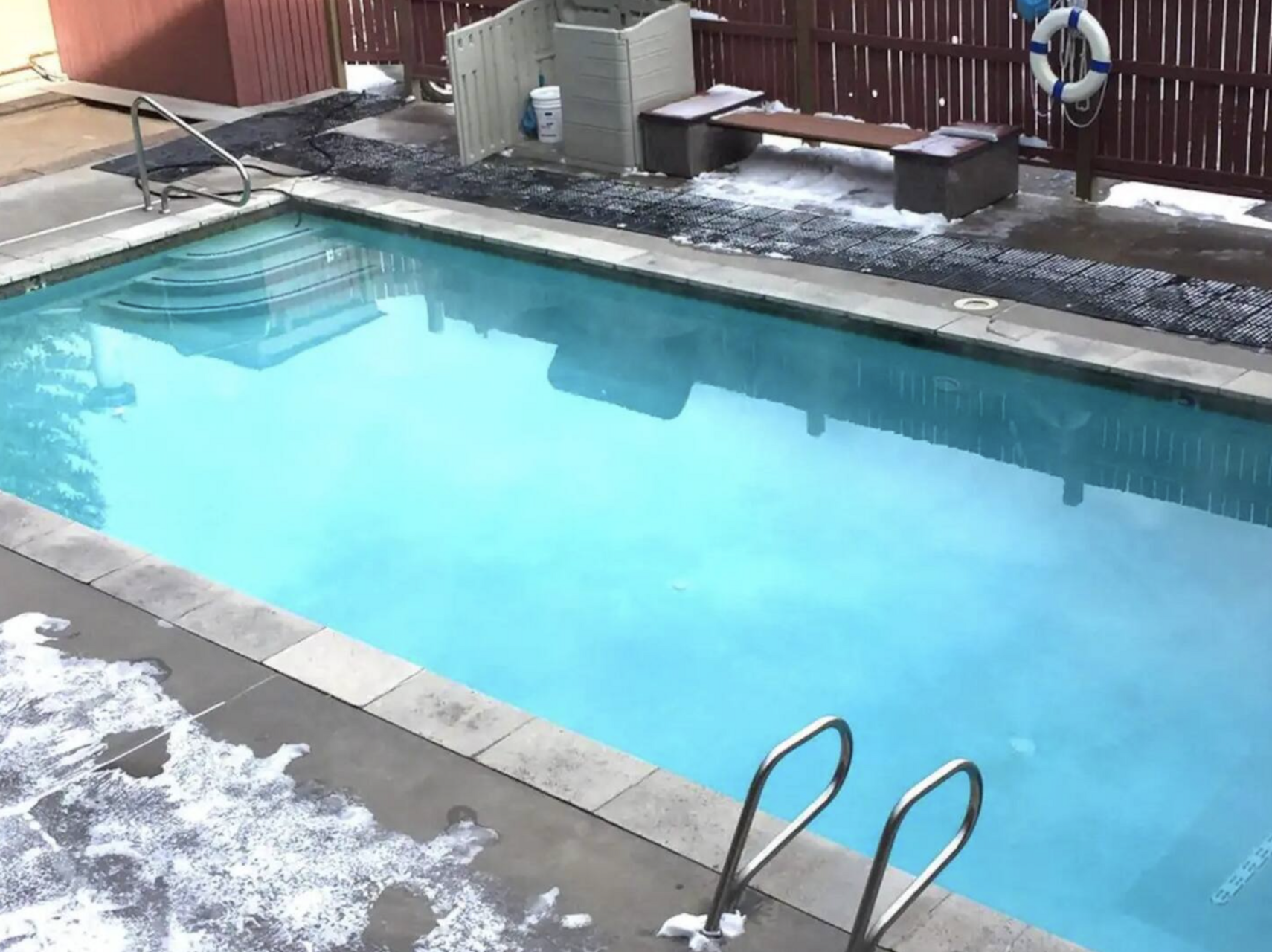 Community pool open year round with hot tub